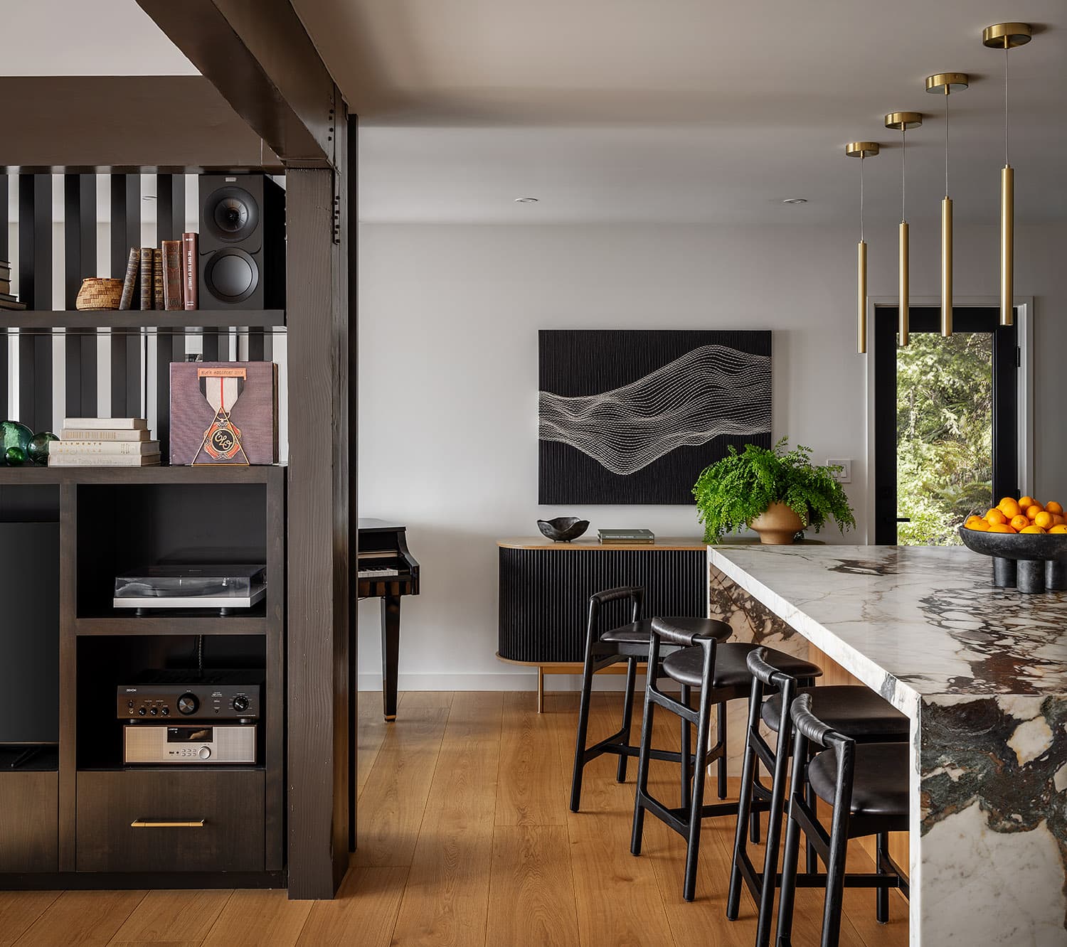 Entry porch with dark board and batten siding, pendant light, and modern front door